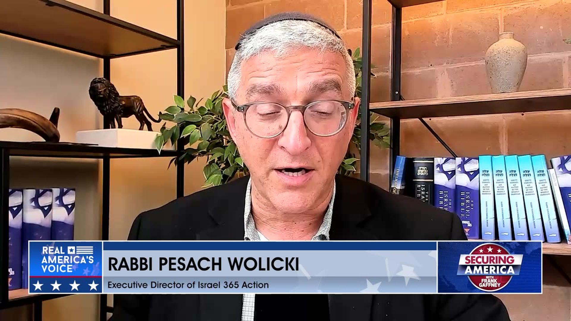 SA514-With Rabbi Pesach Wolicki - Securing America