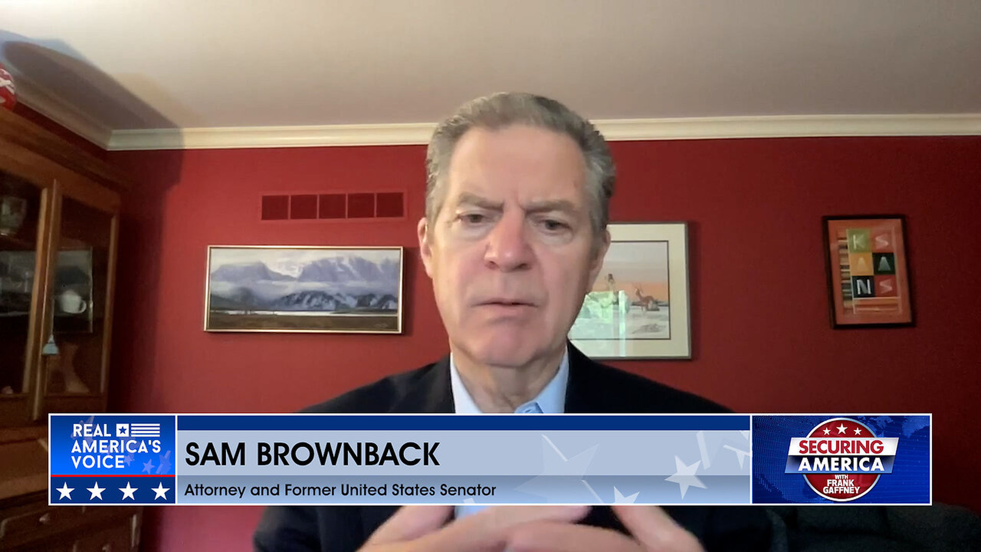 SA535-With Dede Laugesen Sam Brownback - Securing America